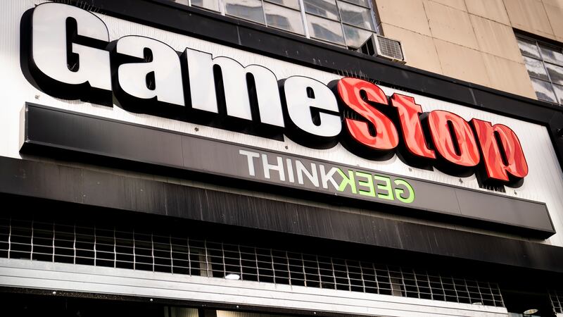 FILE - Pedestrians pass a GameStop store on 14th Street at Union Square, Thursday, Jan. 28,...