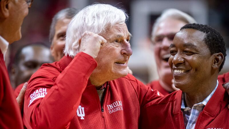 Former Indiana basketball head coach Bobby Knight, left, makes his first appearance at Indiana...