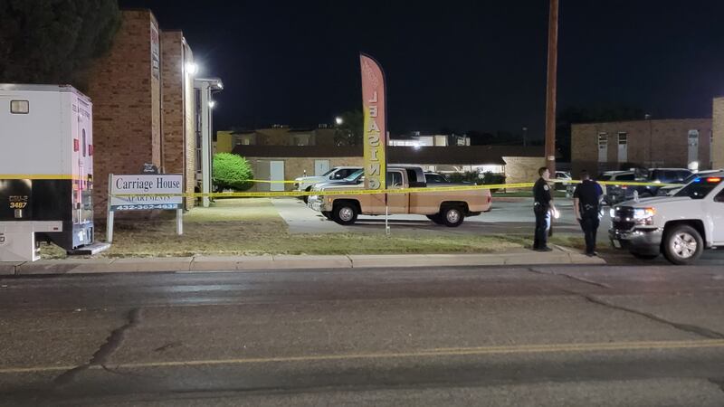 Odessa Police officers at the scene of the shooting located at the Carriage House Apartments.