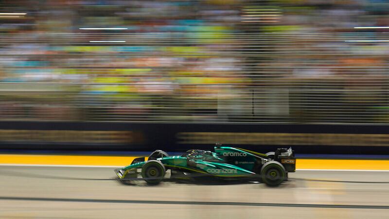 Aston Martin driver Lance Stroll of Canada powers his car during the qualifying session at the...