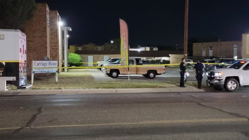 Odessa Police officers at the scene of the shooting located at the Carriage House Apartments.(